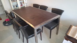 Tavolo da pranzo in acciaio e pelle con 6 sedie abbinate