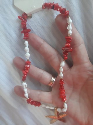 Collar de piedras y estrella dorada de acero
