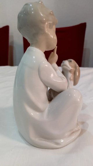 Figura de porcelana lladro niño con perro