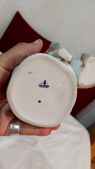 Figura de porcelana lladro niño con perro