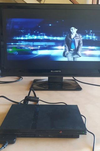 PlayStation 2 Slim Negra + Accesorios