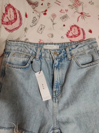 Pantalón vaquero mom high waisted taperes leg