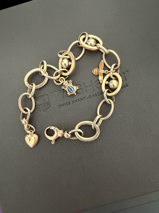 Pulsera oro amarillo con charms 8 gramos