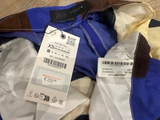 Pantalón Zara fluido estampado