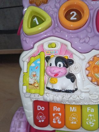 Correpasillos VTech rosa con piano y juegos