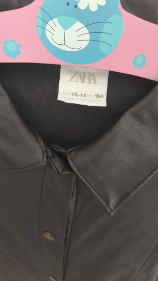 Vestido negro cuero sintético manga abullonada