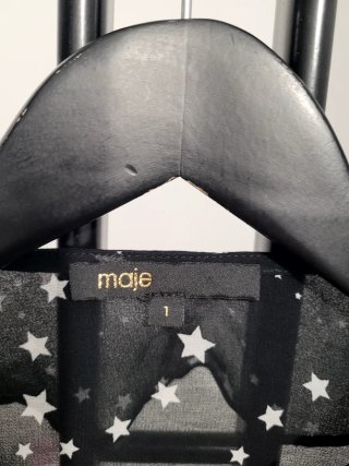 Blusa negra Maje con estrellas blancas