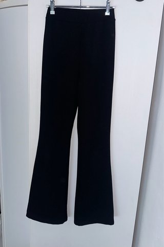 Pantalones campana negros tejido malla
