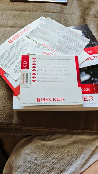 Manuales, CD Sistema y Tarjeta Código Becker Casca