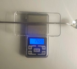 Cuchara de plata vintage con figura