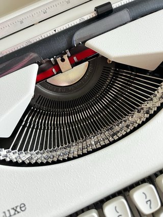 Máquina de escribir Olympia Traveller Deluxe