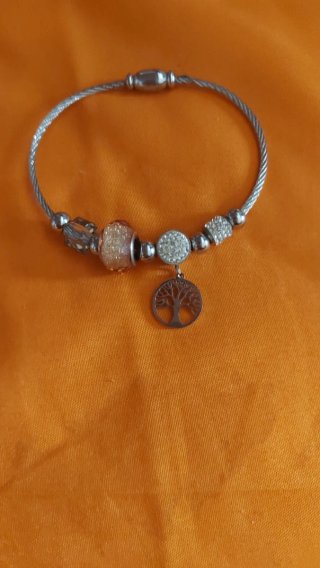 Pulsera plateada con charms árbol de la vida