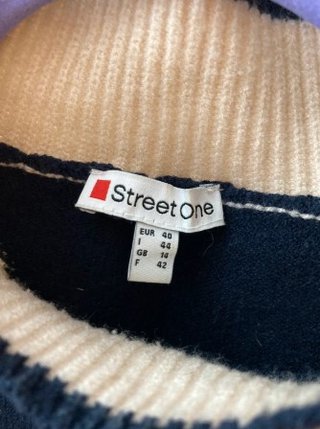 Jersey cuello chimenea beige y azul marino
