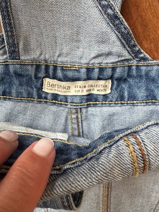 Peto corto vaquero desgastado