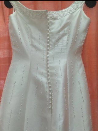 Vestido de Novia Seda marfil con Pedreria.