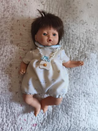 Muñeco bebé llorón con chupete