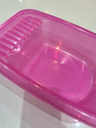 Bañera de juguete rosa brillante