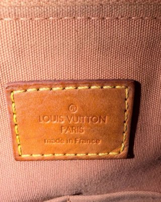 Borsa Louis Vuitton Alma BB in charol arancione
