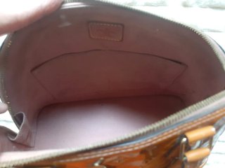 Borsa Louis Vuitton Alma BB in charol arancione