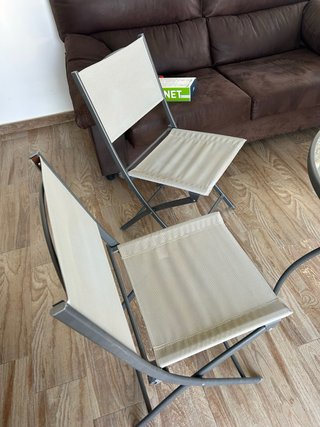 Mesa redonda cristal y silla terraza