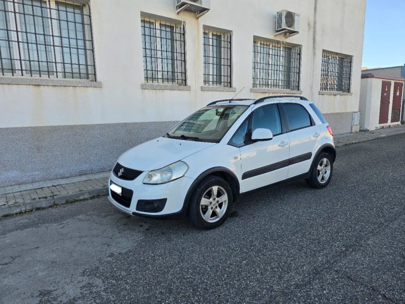 Suzuki SX4 2013. - foto 1