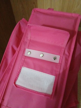 Zapatero colgante rosa de tela
