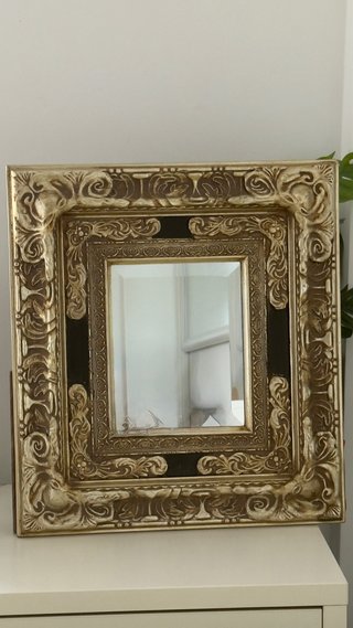 Espejo decorativo dorado y negro