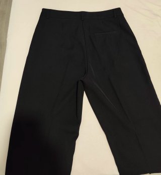 Pantalón negro de pinzas