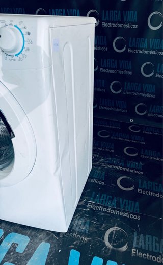 544.Lavadora 9 kilos Candy Inverter 1400Rpm