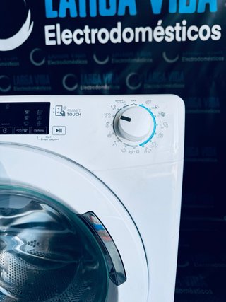 544.Lavadora 9 kilos Candy Inverter 1400Rpm