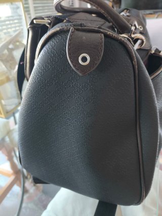 Bolso Salvador Bachiller cuero negro con rayas