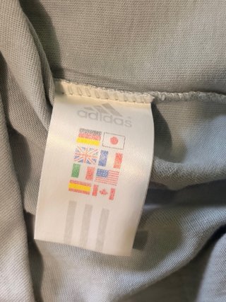 Maglia Adidas grigia con strisce azzurre