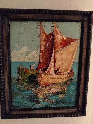 Cuadro al óleo de barcos en el mar