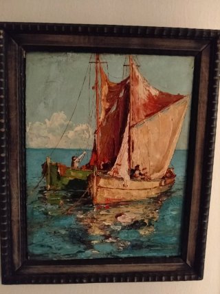 Cuadro al óleo de barcos en el mar