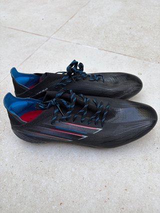 Botas Adidas Speedflow Negras y Azules