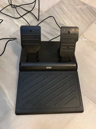 PlayStation 5 con 2 mandos, juegos y volante