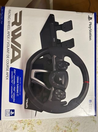 PlayStation 5 con 2 mandos, juegos y volante
