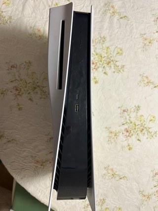 PlayStation 5 con 2 mandos, juegos y volante