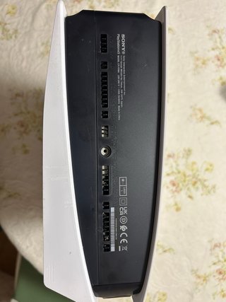 PlayStation 5 con 2 mandos, juegos y volante