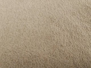 Sofá de tela beige