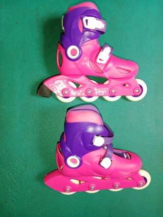 Patines Oxelo rosas y protecciones