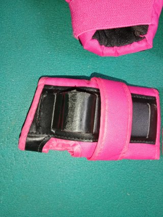 Patines Oxelo rosas y protecciones