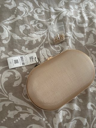 Bolso de mano dorado nuevo