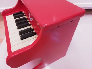 Piano de juguete Janod rojo