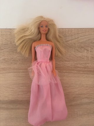 5 Muñecas Barbie en buen estado