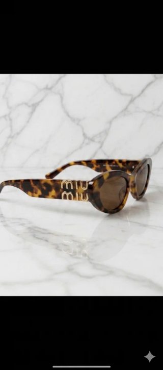 Gafas de sol Miu Cat Miy Eye Carey Marrón