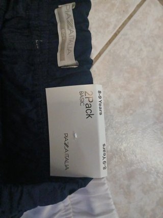 2 paia pantaloncini bimbo bianchi e blu. 8, 9 anni