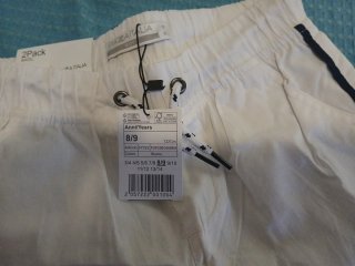 2 paia pantaloncini bimbo bianchi e blu. 8, 9 anni
