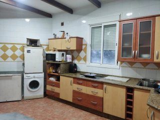 Terreno con casa