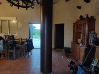 Terreno con casa